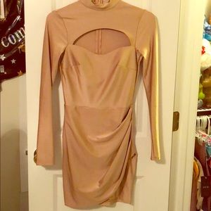 Long sleeve, gold dress.